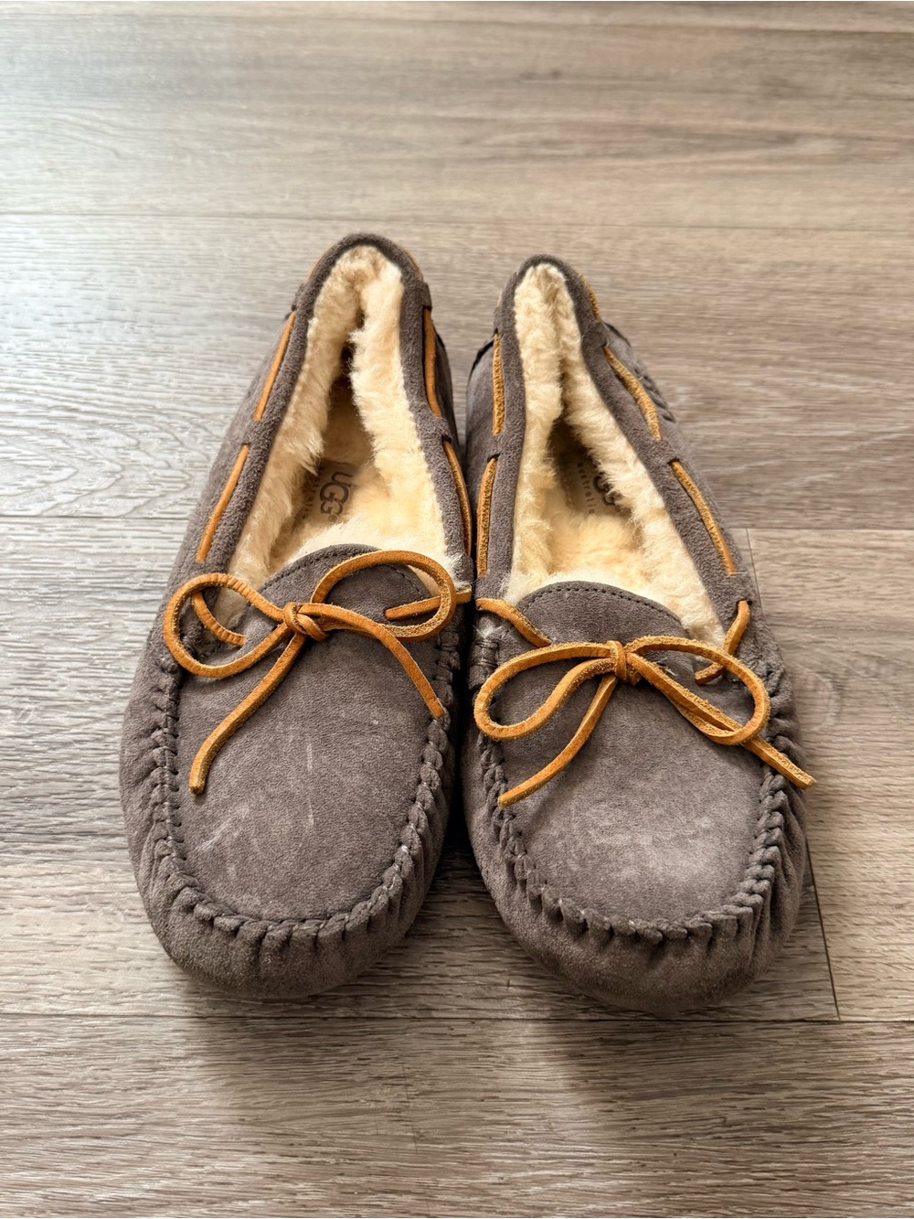 UGG Women's Taupe Suede Shearling Moccasins with Chestnut Bow